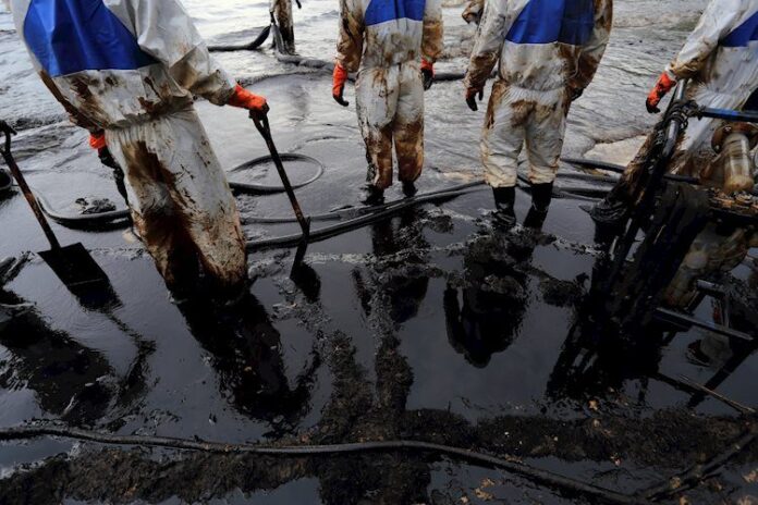 clean-up-crude-oil-stain-27379325_Large.jpg
